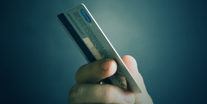 Si può richiedere un prestito per pagare il debito della carta di credito?